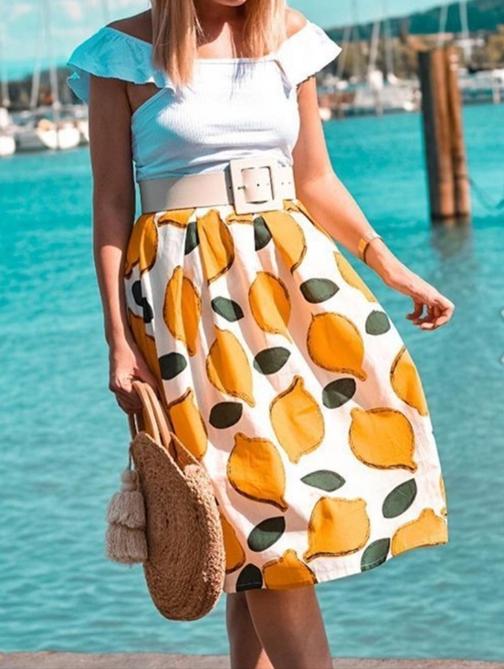 Chicwish Dresses & Skirts - Chicwish White Midi Skirt with Yellow Lemon Print Medium